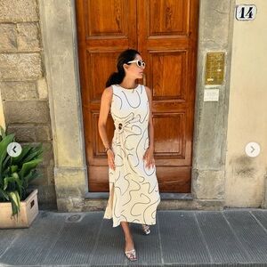 Elegant Cream and Black Abstract Dress